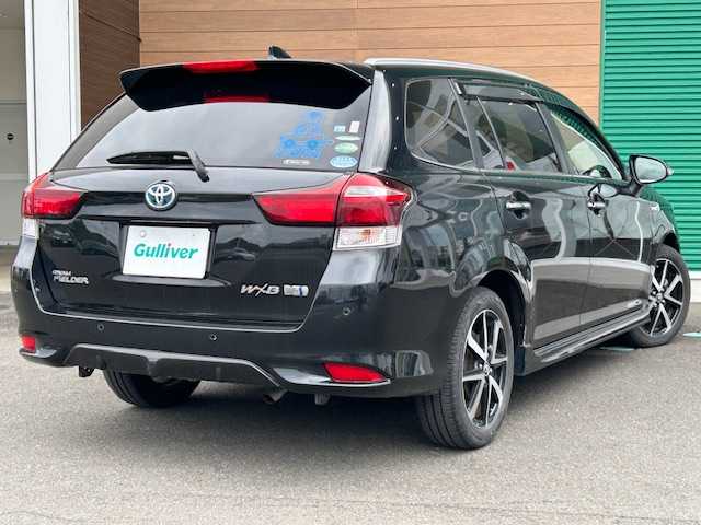 トヨタ カローラ フィールダー ハイブリッドG ダブルバイビー 静岡県 2018(平30)年 4.6万km ブラックマイカ ハイブリッド/トヨタ純正ナビ/（フルセグTV/ Bluetooth/ CD/ FM/ AM)/ビルトインETC/純正16inAW/ハーフレザーシート/前席シートヒーター/プッシュスタート/スマートキー/ドアバイザー/LEDヘッドライト/クリアランスソナー/オートライト/オートマチックハイビーム/保証書/取扱説明書