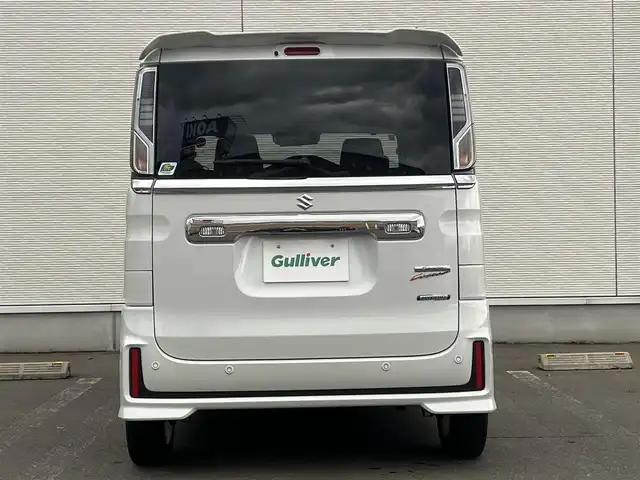 スズキ スペーシア カスタム HYBRID GS 秋田県 2023(令5)年 1.2万km ピュアホワイトP ４WD/衝突軽減システム/LEDヘッドライト/片側パワースライドドア/純正SDナビ（DVD/CD/BT）/フルセグ/スズキ純正アルミ（夏タイヤ装着）/スマートキー/アイドリングストップ/プッシュスタート/クルーズコントロール追従走行有/オートマチックハイビーム/コーナーセンサー/レーンキープアシスト/ステアリングスイッチ/前席シートヒーター/純正フロアマット/純正ドアバイザー/オートライト/オートエアコン/パワーステアリング/パワーウィンドウ/電動格納ウィンカーミラー/横滑り防止/盗難防止装置/寒冷地仕様/取扱説明書/スペアキー×１