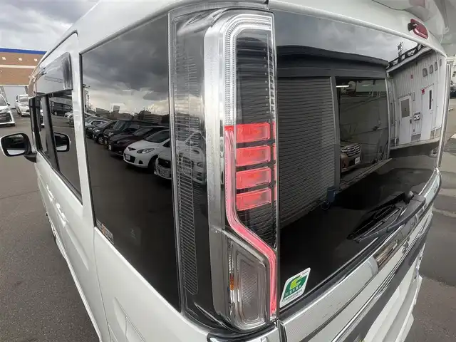 スズキ スペーシア カスタム HYBRID GS 秋田県 2023(令5)年 1.2万km ピュアホワイトP ４WD/衝突軽減システム/LEDヘッドライト/片側パワースライドドア/純正SDナビ（DVD/CD/BT）/フルセグ/スズキ純正アルミ（夏タイヤ装着）/スマートキー/アイドリングストップ/プッシュスタート/クルーズコントロール追従走行有/オートマチックハイビーム/コーナーセンサー/レーンキープアシスト/ステアリングスイッチ/前席シートヒーター/純正フロアマット/純正ドアバイザー/オートライト/オートエアコン/パワーステアリング/パワーウィンドウ/電動格納ウィンカーミラー/横滑り防止/盗難防止装置/寒冷地仕様/取扱説明書/スペアキー×１