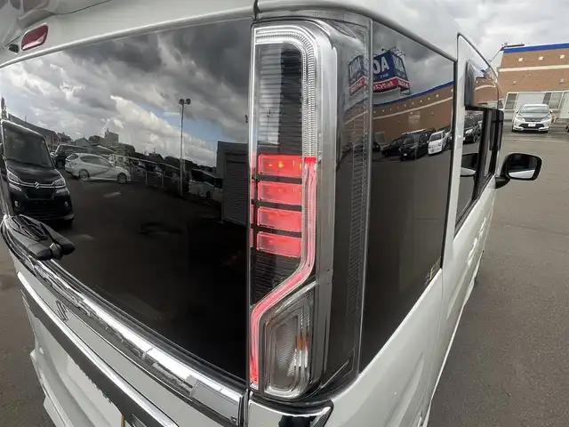 スズキ スペーシア カスタム HYBRID GS 秋田県 2023(令5)年 1.2万km ピュアホワイトP ４WD/衝突軽減システム/LEDヘッドライト/片側パワースライドドア/純正SDナビ（DVD/CD/BT）/フルセグ/スズキ純正アルミ（夏タイヤ装着）/スマートキー/アイドリングストップ/プッシュスタート/クルーズコントロール追従走行有/オートマチックハイビーム/コーナーセンサー/レーンキープアシスト/ステアリングスイッチ/前席シートヒーター/純正フロアマット/純正ドアバイザー/オートライト/オートエアコン/パワーステアリング/パワーウィンドウ/電動格納ウィンカーミラー/横滑り防止/盗難防止装置/寒冷地仕様/取扱説明書/スペアキー×１