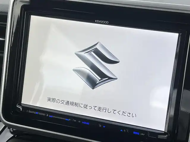 スズキ スペーシア カスタム HYBRID GS 秋田県 2023(令5)年 1.2万km ピュアホワイトP ４WD/衝突軽減システム/LEDヘッドライト/片側パワースライドドア/純正SDナビ（DVD/CD/BT）/フルセグ/スズキ純正アルミ（夏タイヤ装着）/スマートキー/アイドリングストップ/プッシュスタート/クルーズコントロール追従走行有/オートマチックハイビーム/コーナーセンサー/レーンキープアシスト/ステアリングスイッチ/前席シートヒーター/純正フロアマット/純正ドアバイザー/オートライト/オートエアコン/パワーステアリング/パワーウィンドウ/電動格納ウィンカーミラー/横滑り防止/盗難防止装置/寒冷地仕様/取扱説明書/スペアキー×１