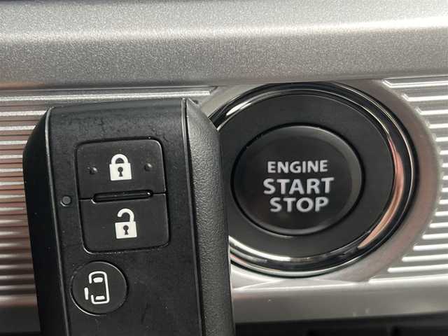 スズキ スペーシア カスタム HYBRID GS 岐阜県 2023(令5)年 1.2万km ピュアホワイトP ４WD/衝突軽減システム/LEDヘッドライト/片側パワースライドドア/純正SDナビ（DVD/CD/BT）/フルセグ（走行中視聴可能）/スズキ純正アルミ（夏タイヤ装着）/スマートキー/アイドリングストップ/プッシュスタート/クルーズコントロール追従走行有/オートマチックハイビーム/コーナーセンサー/レーンキープアシスト/ステアリングスイッチ/前席シートヒーター/純正フロアマット/純正ドアバイザー/オートライト/オートエアコン/パワーステアリング/パワーウィンドウ/電動格納ウィンカーミラー/横滑り防止/盗難防止装置/寒冷地仕様/取扱説明書/スペアキー×１