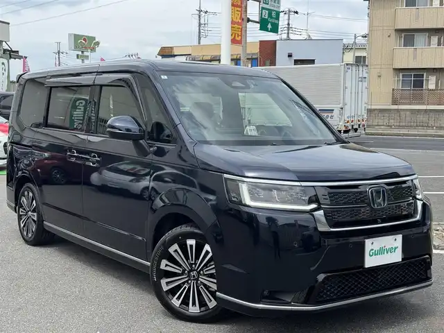 ホンダ ステップワゴン スパーダ eHEV プレミアムライン 千葉県 2024(令6)年 1.3万km ミッドナイトブルービームM ワンオーナー/ホンダセンシング /レーダークルーズコントロール/レーンキープアシスト/ブラインドスポットモニター/純正11.4インチナビ/フルセグTV/Bluetooth/カープレイ/バックカメラ/ハーフレザーシート/シートヒーター（前席・2列目）/純正ETC2.0/純正ドライブレコーダー/純正フロアマット/純正17インチAW/革巻きステアリング/プッシュスタート/スマートキー/保証書・取説/スペアキー