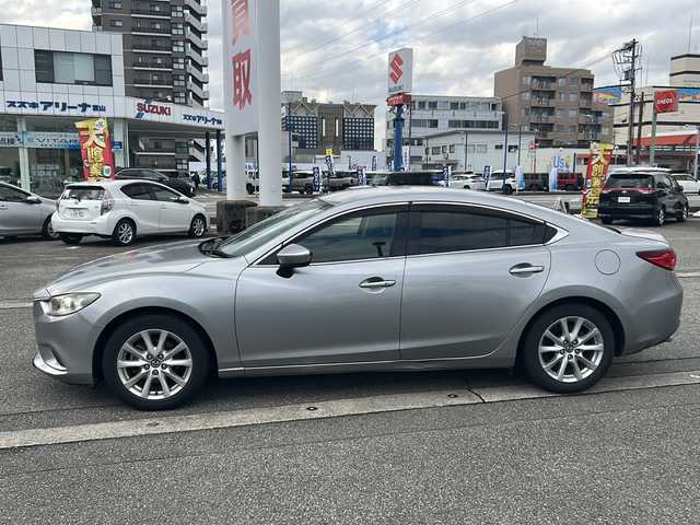 マツダ アテンザ セダン 20S 富山県 2013(平25)年 5.9万km アルミニウムメタリック スマートキー/社外メモリーナビ(C9P8)/DVD/BT/フルセグTV/USB/AUX/バックカメラ/電格ウィンカーミラー/フォグランプ/パドルシフト/クルーズコントロール/皮巻きステアリング/プッシュスタート/アイドリングストップ/ヘッドライトレベライザー/オートライト/純正17インチAW/横滑り防止装置/保証書・取説/社外AWスタッドレス車載(215/65R16)