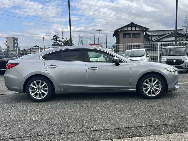 マツダ アテンザ セダン 20S 富山県 2013(平25)年 5.9万km アルミニウムメタリック スマートキー/社外メモリーナビ(C9P8)/DVD/BT/フルセグTV/USB/AUX/バックカメラ/電格ウィンカーミラー/フォグランプ/パドルシフト/クルーズコントロール/皮巻きステアリング/プッシュスタート/アイドリングストップ/ヘッドライトレベライザー/オートライト/純正17インチAW/横滑り防止装置/保証書・取説/社外AWスタッドレス車載(215/65R16)