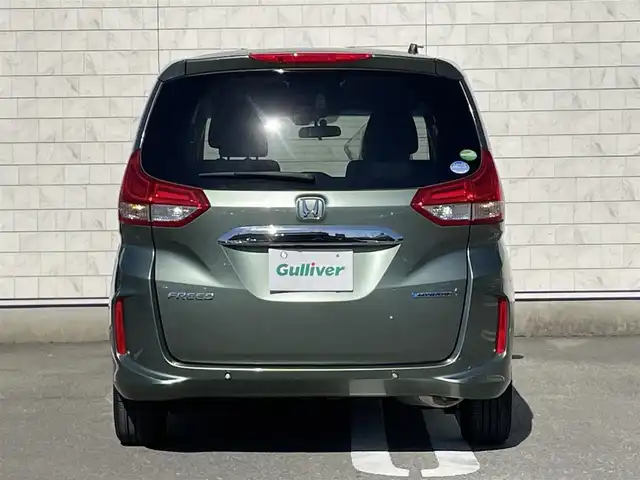 ホンダ フリード ハイブリット G ホンダセンシング 福岡県 2020(令2)年 2.7万km シルバーミストグリーンM 社外8型SDナビ(フルセグTV/CD/DVD/BT)ホンダセンシングフリップダウンモニター両側パワスラクルコンドラレコETCシートヒーターUSB純正LED純正アルミホイールプッシュスタートスマートキー