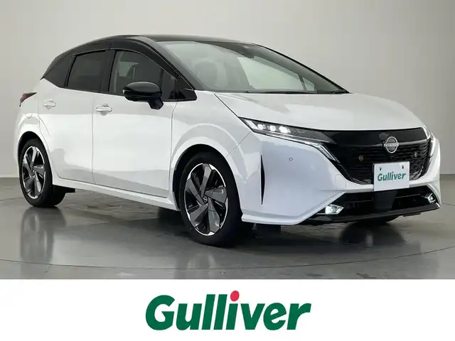 日産 オーラ G 愛知県 2022(令4)年 2.7万km ピュアホワイトパール / スーパーブラック 2トーン 純正９型ディスプレイ　ＢＯＳＥ　禁煙車　スマートルームミラー　プロパイロット　全方位カメラ　ＢＳＭ　フルセグ　ＨＤＭＩ　カープレイ　ＥＴＣ２．０　純正ドラレコ　ハーフレザー　衝突軽減　ワイヤレス充電　ＬＥＤライト　コーナーセンサー　オートハイビーム　ツートンカラー　純正フロアマット