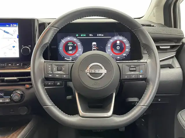 日産 オーラ G 愛知県 2022(令4)年 2.7万km ピュアホワイトパール / スーパーブラック 2トーン 純正９型ディスプレイ　ＢＯＳＥ　禁煙車　スマートルームミラー　プロパイロット　全方位カメラ　ＢＳＭ　フルセグ　ＨＤＭＩ　カープレイ　ＥＴＣ２．０　純正ドラレコ　ハーフレザー　衝突軽減　ワイヤレス充電　ＬＥＤライト　コーナーセンサー　オートハイビーム　ツートンカラー　純正フロアマット