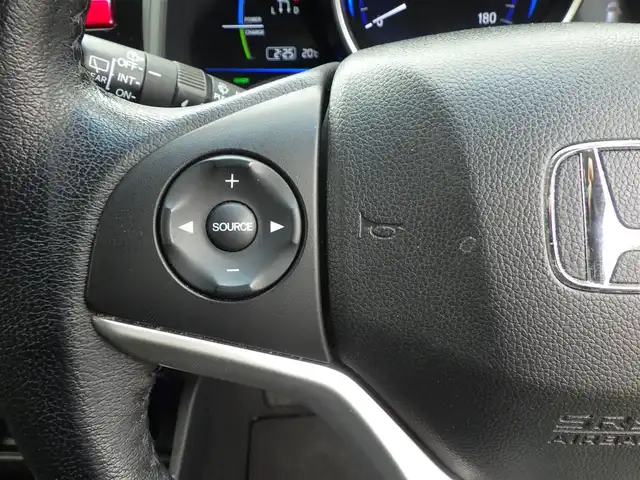 ホンダ フィット ハイブリット L ホンダセンシング 千葉県 2017(平29)年 5.2万km プレミアムホワイトパールⅡ CTBA（シティブレーキアクティブシステム）　/純正メモリーナビ/地デジTV/【DVD/CD再生機能　Bluetooth接続】/バックカメラ/ハーフレザーシート/革巻きステアリング/ETC/LEDヘッドライト/ウインカーミラー/サイド/カーテンエアバッグ/Honda スマートキー