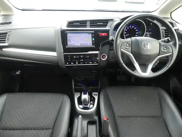 ホンダ フィット ハイブリット L ホンダセンシング 千葉県 2017(平29)年 5.2万km プレミアムホワイトパールⅡ CTBA（シティブレーキアクティブシステム）　/純正メモリーナビ/地デジTV/【DVD/CD再生機能　Bluetooth接続】/バックカメラ/ハーフレザーシート/革巻きステアリング/ETC/LEDヘッドライト/ウインカーミラー/サイド/カーテンエアバッグ/Honda スマートキー