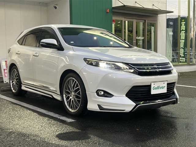 トヨタ ハリアー 京都府 2015(平27)年 7.1万km ホワイトパールクリスタルシャイン 社外９インチナビ　モデリスタエアロ　バックカメラ　パワーシート　クルーズコントロール　ＥＴＣ　アイドリングストップ　Ｂｌｕｅｔｏｏｔｈ　ＬＥＤライト　フルセグテレビ　ハーフレザーシート　禁煙車