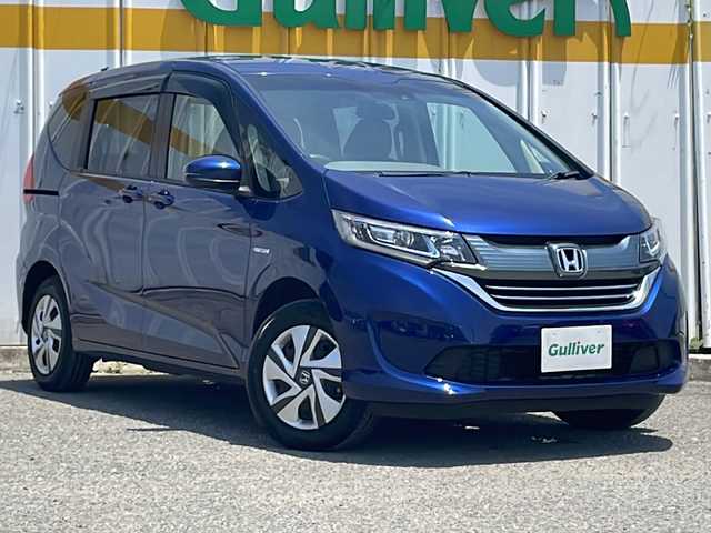 ホンダ フリード ハイブリット G ホンダセンシング 道央・札幌 2019(平31)年 3.1万km コバルトブルーパール 外部検査実施済み/4WD/ワンオーナー/純正メモリナビ【VXM-195VEi】/(DVD/フルセグTV/Bluetooth/USB/MSV)/バックカメラ/ビルトインETC/フリップダウンモニター/両側パワースライドドア/前方ドライブレコーダー/HONDA SENSING/・アダプティブクルーズコントロール（ACC）/・衝突軽減ブレーキ（CMBS）/・車線維持支援システム（LKAS）/・誤発進抑制機能/・先行車発進お知らせ機能/・オートハイビーム/・標識認識機能/横滑り防止機能/スマートキー/LEDヘッドライト/スペアキーｘ１/保証書・取説