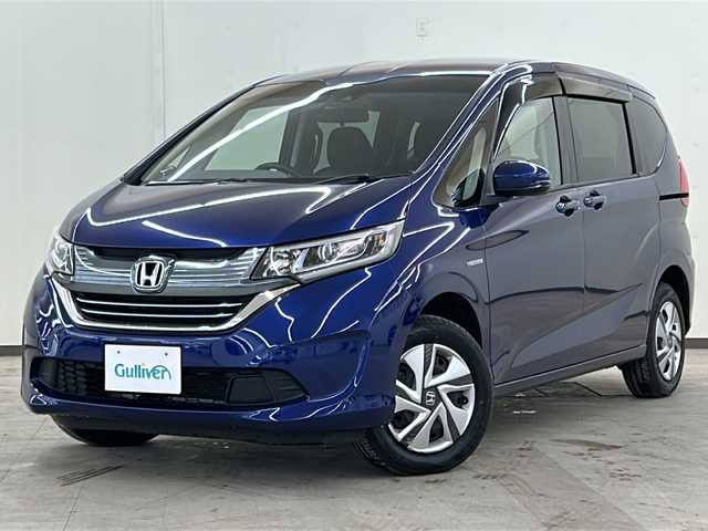 ホンダ フリード ハイブリット G ホンダセンシング 道央・札幌 2019(平31)年 3.1万km コバルトブルーパール /純正メモリナビ(VXM-195VEi)//フルセグTV//ビルトインETC//純正フリップダウンモニター//HONDA SENSING//アダプティブクルーズコントロール（ACC）//衝突軽減ブレーキ（CMBS）//車線維持支援システム（LKAS）//誤発進抑制機能//先行車発進お知らせ機能//オートハイビーム//標識認識機能//横滑り防止機能//前方ドライブレコーダー//Bluetooth//USB//両側パワースライドドア//ABS//スマートキー//純正LEDヘッドライト//スペアキーｘ１