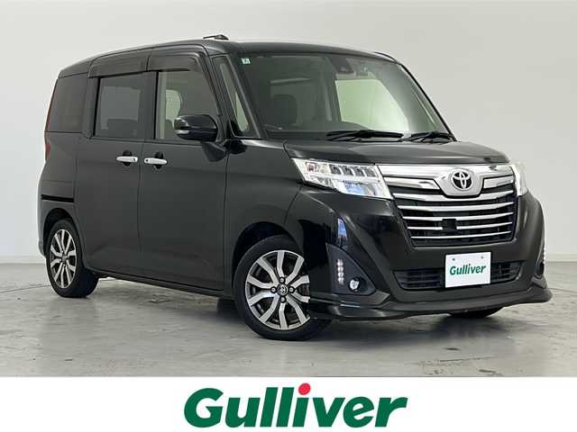 トヨタ ルーミー カスタムG－T 宮城県 2018(平30)年 6万km ブラックマイカメタリック スマートアシストII/・衝突軽減ブレーキ/・レーンキープアシスト/純正9インチナビ/地図SDカード無/・CD.DVD.SD.BT/バックカメラ/両側パワースライドドア/クルーズコントロール/ビルトインＥＴＣ/前席シートヒーター/前後ドライブレコーダー/LEDヘッドライト/フォグランプ/アイドリングストップ/横滑り防止装置/プッシュスタート/スマートキー/純正15インチアルミホイール/ロールサンシェード/シートバックテーブル