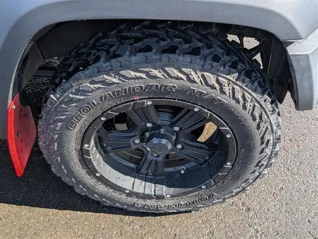 スズキ ジムニー シエラ JC 福井県 2019(平31)年 6万km ジャングルグリーン ワンオーナー/PanasonicナビTV/(Bluetooth/フルセグTV/CD/DVD)/バックモニター/クルーズコントロール/衝突軽減装置/レーンキープアシスト/ダウンヒルアシストコントロール/オートマチックハイビーム/4WD/センターデフロック/背面タイヤ/ルーフキャリア/純正AW/純正フロアマット/ETC/ドライブレコーダー/純正LEDヘッドライト/スマートキー