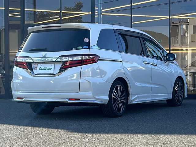 ホンダ オデッセイ アブソルート EX 大阪府 2015(平27)年 7.9万km ホワイトオーキッドパール ワンオーナー　衝突軽減システム　両側パワースライドドア　純正ナビ　全周囲カメラ　フルセグＴＶ　ＤＶＤ　ＣＤ　Ｂｌｕｅｔｏｏｔｈ　ＨＤＭＩ　フリップダウンモニター　Ｐアシスト　ＢＳＭ　レーダークルコン　ドライブレコーダー　2列目サンシェード　ETC　プッシュスタート　スマートキー　スペアキー　取扱説明書　保証書　