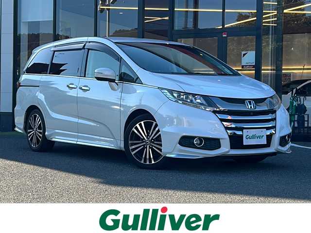 ホンダ オデッセイ アブソルート EX 大阪府 2015(平27)年 7.9万km ホワイトオーキッドパール ワンオーナー　衝突軽減システム　両側パワースライドドア　純正ナビ　全周囲カメラ　フルセグＴＶ　ＤＶＤ　ＣＤ　Ｂｌｕｅｔｏｏｔｈ　ＨＤＭＩ　フリップダウンモニター　Ｐアシスト　ＢＳＭ　レーダークルコン　ドライブレコーダー　2列目サンシェード　ETC　プッシュスタート　スマートキー　スペアキー　取扱説明書　保証書　