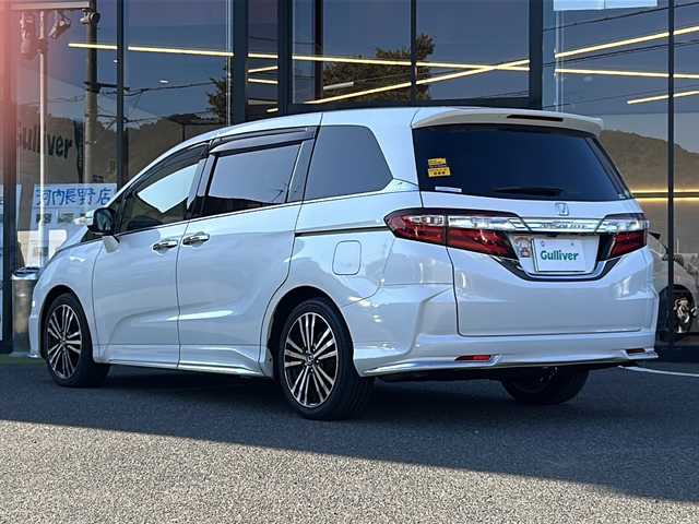 ホンダ オデッセイ アブソルート EX 大阪府 2015(平27)年 7.9万km ホワイトオーキッドパール ワンオーナー　衝突軽減システム　両側パワースライドドア　純正ナビ　全周囲カメラ　フルセグＴＶ　ＤＶＤ　ＣＤ　Ｂｌｕｅｔｏｏｔｈ　ＨＤＭＩ　フリップダウンモニター　Ｐアシスト　ＢＳＭ　レーダークルコン　ドライブレコーダー　2列目サンシェード　ETC　プッシュスタート　スマートキー　スペアキー　取扱説明書　保証書　