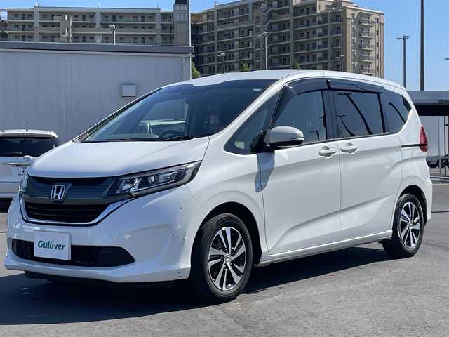 ホンダ フリード G ホンダセンシング 千葉県 2018(平30)年 7万km ホワイトオーキッドパール ワンオーナー/ホンダセンシング/両側パワースライドドア /純正7インチナビ/Bluetooth/フルセグTV/バックカメラ/クルーズコントロール/ステアリングスイッチ/ETC/スペアキー/純正フロアマット/純正ドアバイザー/LEDヘッドライト/コンフォートビューパッケージ