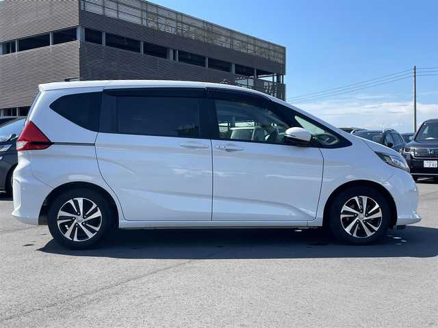 ホンダ フリード G ホンダセンシング 千葉県 2018(平30)年 7万km ホワイトオーキッドパール ワンオーナー/ホンダセンシング/両側パワースライドドア /純正7インチナビ/Bluetooth/フルセグTV/バックカメラ/クルーズコントロール/ステアリングスイッチ/ETC/スペアキー/純正フロアマット/純正ドアバイザー/LEDヘッドライト/コンフォートビューパッケージ