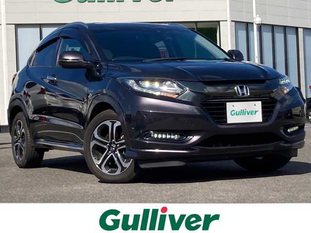 ホンダ ヴェゼル ハイブリッド Z ホンダセンシング 佐賀県 2016(平28)年 9.2万km ルーセブラックM ワンオーナー/Gathersナビ/バックカメラ/衝突被害軽減ブレーキ/路線逸脱警報/アダプティブクルーズコントロール/電動パーキングブレーキ/オートブレーキホールド/ステアリングリモコン/パドルシフト/ハーフレザーシート/シートヒーター/ドライブレコーダー/ビルトインＥＴＣ/プッシュスタート/スマートキー/LEDヘッドライト/フォグライト/純正アルミホイール