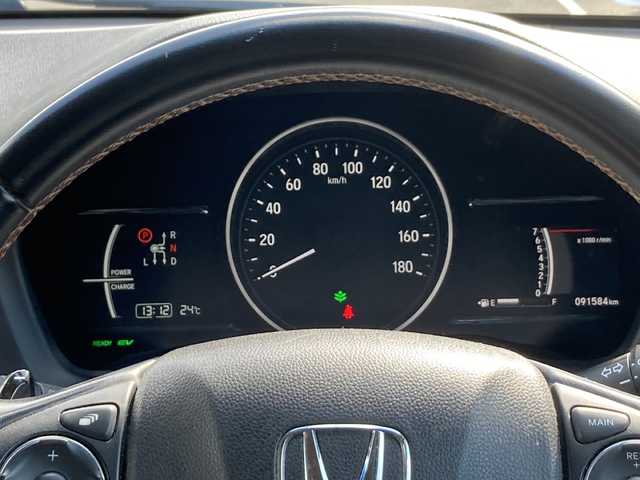 ホンダ ヴェゼル ハイブリッド Z ホンダセンシング 佐賀県 2016(平28)年 9.2万km ルーセブラックM ワンオーナー/Gathersナビ/バックカメラ/衝突被害軽減ブレーキ/路線逸脱警報/アダプティブクルーズコントロール/電動パーキングブレーキ/オートブレーキホールド/ステアリングリモコン/パドルシフト/ハーフレザーシート/シートヒーター/ドライブレコーダー/ビルトインＥＴＣ/プッシュスタート/スマートキー/LEDヘッドライト/フォグライト/純正アルミホイール