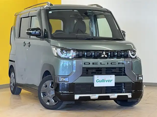三菱 デリカミニ T 群馬県 2024(令6)年 1.3万km 緑Ⅱ 安全装備/・衝突軽減ブレーキ/・レーンキープアシスト/・ダウンヒルアシスト/・クリアランスソナー/・オートハイビーム/・オートライト/・横滑り防止/社外７インチナビ/・AM/FM/ワンセグTV/・Bluetooth/CD/AUX/バックカメラ/前席シートヒーター/パドルシフト/片側電動スライドドア/ETC/LEDヘッドライト/LEDフォグランプ/純正ドアバイザー/スマートキー/プッシュスタート