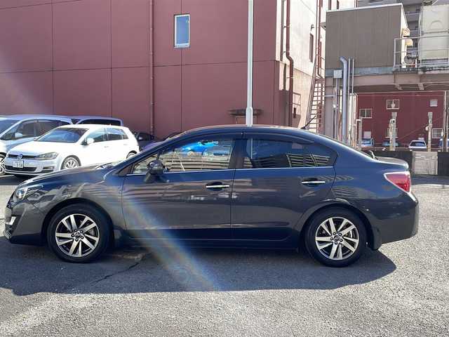 スバル インプレッサ Ｇ４ 2．0i アイサイト プラウドED 宮崎県 2015(平27)年 2.3万km ダークグレーメタリック 社外SDナビ/フルセグテレビ/Bluetooth/アイドリングストップ/クルーズコントロール/プッシュスタート/ETC/純正アルミホイール/純正フロアマット/パワーシート/ドライブレコーダー/オートライト/パワーステアリング/パワーウィンドウ