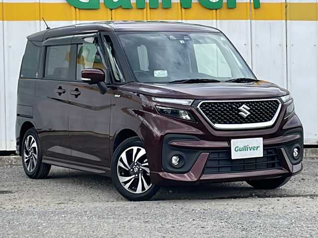 スズキ ソリオ バンディット HV MV 佐賀県 2022(令4)年 1.3万km メロウディープレッドパール 外部検査実施済み/ワンオーナー/両側パワースライドドア/前席シートヒーター/純正メモリナビ/(DVD/フルセグTV/Bluetooth/USB)/全方位カメラ/セーフティーサポート/・デュアルカメラブレーキサポート/・誤発進抑制機能/・後退時ブレーキサポート/・後方誤発進抑制機能/・リアパーキングセンサー/・車線逸脱抑制機能/・車線逸脱警報機能/・ふらつき警報機能/・先行車発進お知らせ機能/・アダプティブクルーズコントロール/・ハイビームアシスト/・標識認識機能/ヘッドアップディスプレイ/純正15インチアルミホイール/スマートキー×２/LEDヘッドライト/ビルトインETC/新車時保証書/取扱説明書