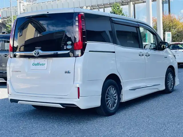 トヨタ エスクァイア ハイブリッド Gi 千葉県 2016(平28)年 6.9万km ホワイトパールクリスタルシャイン モデリスタエアロ/純正ナビ【フルセグ、BT、CD】/純正15インチアルミホイール/純正ドラレコ（前：DRT-H64A）/純正インテリアイルミネーション/純正フリップダウンモニター/純正フロアマット/社外15インチアルミ付冬タイヤ積込/ビルトインETC/クルーズコントロール/TRC/前席ヒーター/デュアルAC/置くだけ充電/オートライト/フォグ/ロック連動ミラー/バックカメラ/ドアバイザー/保証書