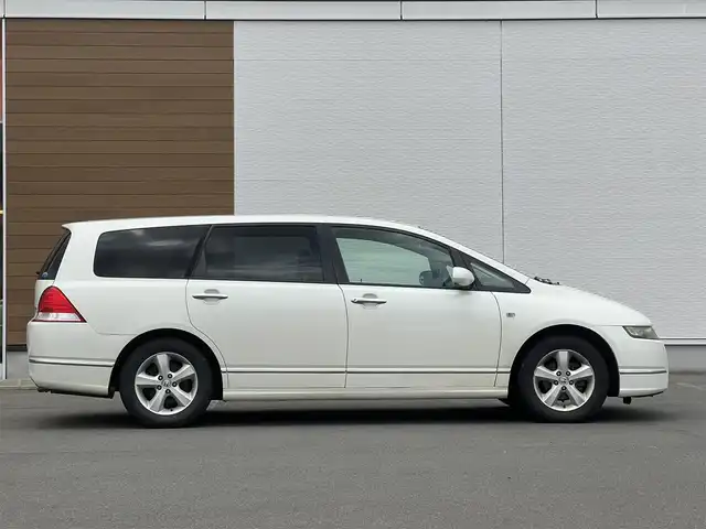 ホンダ オデッセイ M 秋田県 2006(平18)年 17.9万km プレミアムホワイトパール 社外ナビ/リモコンキー/純正アルミ/ETC/純正フロアマット/アイドリングストップ/MTモード付AT/オートエアコン/パワーウィンドウ/パワーステアリング/盗難防止装置/電動格納ミラー/保証書/取扱説明書/記録簿