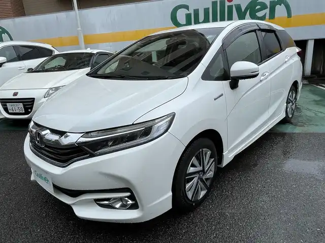ホンダ シャトル ハイブリッド X スタイルエディション 静岡県 2016(平28)年 10.2万km ホワイトオーキッドパール シティブレーキアクティブシステム/社外ナビ/フルセグTV/DVD/CD/SD/BT/MSV/バックカメラ/ハーフレザーシート/ビルトインETC/LEDヘッドライト/クルーズコントロール/ステアリングスイッチ/パドルシフト/スマートキー×2/保証書/取扱説明書/ナビ取扱説明書/R1/2/3/5点検記録簿有