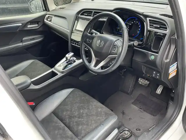 ホンダ シャトル ハイブリッド X スタイルエディション 静岡県 2016(平28)年 10.2万km ホワイトオーキッドパール シティブレーキアクティブシステム/社外ナビ/フルセグTV/DVD/CD/SD/BT/MSV/バックカメラ/ハーフレザーシート/ビルトインETC/LEDヘッドライト/クルーズコントロール/ステアリングスイッチ/パドルシフト/スマートキー×2/保証書/取扱説明書/ナビ取扱説明書/R1/2/3/5点検記録簿有