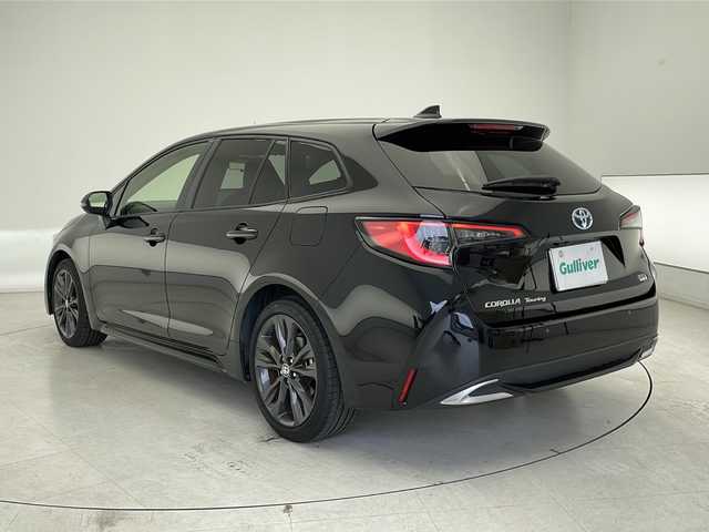 トヨタ カローラツーリング ハイブリッド ダブルバイビー 千葉県 2023(令5)年 2.7万km アティチュードブラックマイカ 衝突軽減ブレーキ/レーンキープアシスト/レーダークルーズコントロール/オートマチックハイビーム/純正メモリナビ/（フルセグ/Bluetooth/USB/FM/AM/HDMI）/バックカメラ/ＥＴＣ/ドライブレコーダー（前後）/ハーフレザーシート/シートヒーター（運転席＋助手席）/ステアリングヒーター/ヘッドアップディスプレイ/LEDヘッドライト/W＋サイド＋カーテンエアバッグ