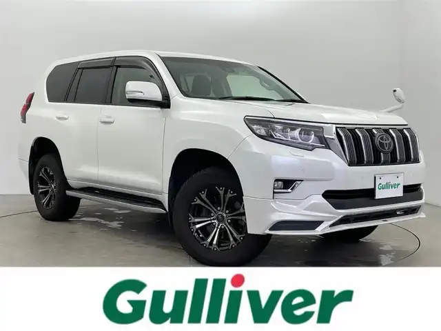 トヨタ ランドクルーザー プラド TX 富山県 2017(平29)年 9万km ホワイトパールクリスタルシャイン ワンオーナー/4WD/ディーゼル/ターボ/純正AW付き夏タイヤ積込/純正ナビ【NSZT-W66T】/(AM/FM/CD/DVD/SD/USB/BT/HDMI)/フルセグTV/ヘッドレストモニター×２/バックカメラ/TRDフロント/リアエアロ/サンルーフ/レーダークルーズコントロール/プリクラッシュセーフティ/レーンディパーチャーアラート/オートマチックハイビーム/LEDヘッドライト/社外イエローフォグランプ/クリアランスソナー/センターデフロック/ダウンヒルアシストコントロール/ドライブレコーダー/ETC/スマートキー×２/プッシュスタート/純正フロアマット/取扱説明書/保証書