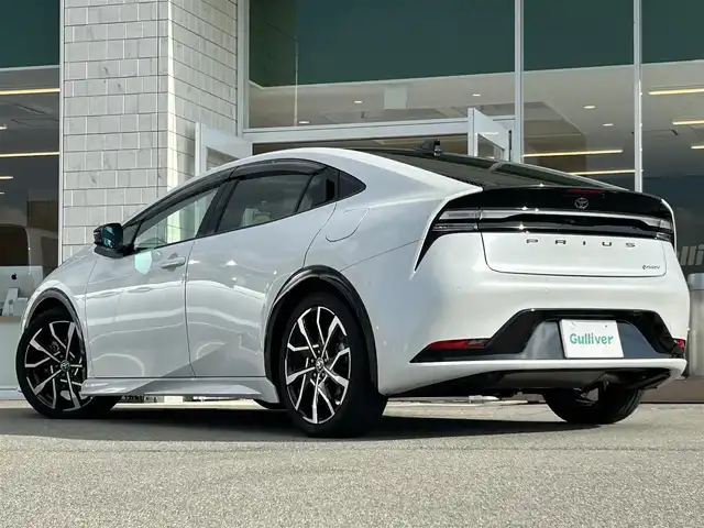 トヨタ プリウス Z 兵庫県 2023(令5)年 1.3万km プラチナホワイトパールマイカ メーカーOPナビ/モデリスタエアロ/パノラマルーフ/アラウンドビューモニター/電動リアゲート/トヨタセーフティセンス/ビルトインETC2.0/シートヒーター/エアーシート/ステアリングヒーター/前後ドライブレコーダー/ブラインドスポットモニター/デジタルインナーミラー/純正フロアマット/純正アルミホイール