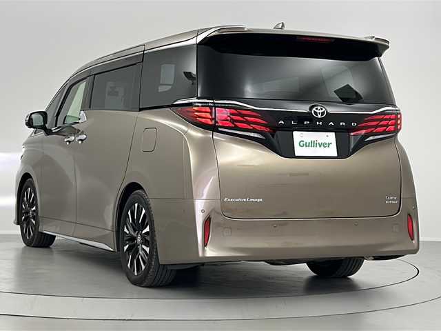 トヨタ アルファードハイブリット エグゼクティブ ラウンジ 福島県 2023(令5)年 1.1万km 茶 /禁煙車/／左右独立ツインムーンルーフ/／純正後席モニター/／トヨタチームメイト/・アドバンスドパーク//Toyota Safety Sense/・プリクラッシュセーフティ/・レーントレーシングアシスト/・レーダークルーズコントロール/・オートマチックハイビーム/／ブラインドスポットモニター/／カラーヘッドアップディスプレイ/／パノラミックビューモニター/／デジタルインナーミラー/／ユニバーサルステップ/／純正１４型ディスプレイオーディオナビ/・BT.CD.DVD.USB.スマホ連携/・フルセグTV/／両側パワースライドドア/／電動リアゲート/／黒本革シート/／全席温冷シート/／全席パワーシート/／前後ドライブレコーダー/／ビルトインETC2.0/／三眼LEDヘッドライト/／LEDフォグライト/／ワイヤレス充電