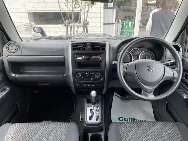 スズキ ジムニー XC 石川県 2015(平27)年 5.6万km 紺 4WD/ターボ/純正オーディオ/キーレス/電動ミラー/背面タイヤ/ABS/純正アルミホイール