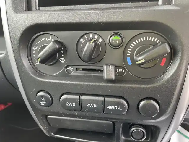 スズキ ジムニー XC 石川県 2015(平27)年 5.6万km 紺 4WD/ターボ/純正オーディオ/キーレス/電動ミラー/背面タイヤ/ABS/純正アルミホイール