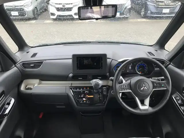 三菱 デリカミニ T プレミアム 富山県 2023(令5)年 0.1千km Ｄグリーン 届出済未使用車/リフトアップサスペンション/純正OPサイドデカール/純正OPオールウェザーマット/純正OPエクシードバイザー/デジタルインナーミラー/全周囲カメラ/マイパイロット/衝突被害軽減ブレーキ/コーナーセンサー/レーンキープアシスト/シートヒーター/ステアリングヒーター/両側パワースライドドア/プッシュスタート/スマートキー/LEDヘッドライト/オートライト