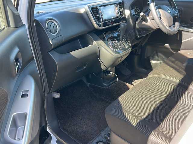 三菱 ｅＫスペース カスタムT 秋田県 2014(平26)年 7.7万km シルキーホワイト 純正メモリナビ/純正CD、DVD、BT、TV/純正15インチAW/純正フロアマット/両側パワースライドドア/バックカメラ/ドライブレコーダー/スペアキー/取説、保証書/４WD