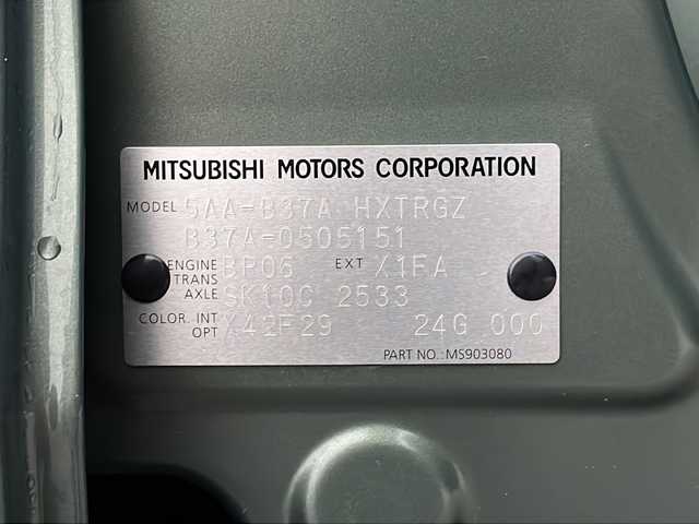 三菱 デリカミニ G 福島県 2024(令6)年 0.3万km Ｄグリーン ワンオナ　純９ナビ　バックＣ　ＢＴ　フルセグ　片側パワスラ　Ｅアシスト　ＬＥＤヘッドライト　フォグ　前席シートヒーター　ハーフレザー　自動防眩ミラー　黒革巻ステアリング　ステリモ　スペアキー　保証書/色コード【X42F29】