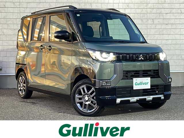 三菱 デリカミニ G 福島県 2024(令6)年 0.3万km Ｄグリーン ワンオナ　純９ナビ　バックＣ　ＢＴ　フルセグ　片側パワスラ　Ｅアシスト　ＬＥＤヘッドライト　フォグ　前席シートヒーター　ハーフレザー　自動防眩ミラー　黒革巻ステアリング　ステリモ　スペアキー　保証書/色コード【X42F29】