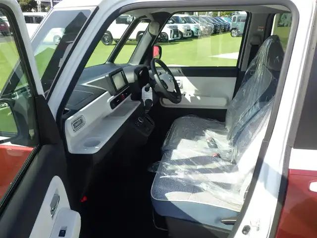 ダイハツ ムーヴ キャンバス ストライプス G 千葉県 2025(令7)年 0.1千km シャイニングホワイトパール/ファイアークォーツレッドメタリック リラックススタイル/（メーカーオプションのみ）/スマートアシストIII/エコアイドル/両側パワースライドドア/純正メモリーナビ/地デジTV/【DVD/CD再生機能】/バックカメラ/前席シートヒーター/ステアリングスイッチ/LEDヘッドライト/フォグライト/コーナーセンサー/サイド/カーテンエアバッグ/キーフリーシステム