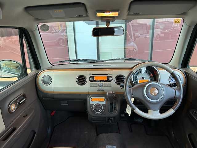 スズキ ラパン ショコラ X 宮城県 2014(平26)年 4.9万km シャンパンピンクPM 登録時走行距離４８２５２ｋｍ/プッシュスタート/アイドリングストップ/オートライト/スマートキー/ショコラ専用シート/純正フロアマット/ベンチシート/純正オーディオ/CD/AM/FM/LEDヘッドライト/ドアバイザー/純正アルミホイール/Wミラー/運転席シガーソケット/ABS/横滑り防止装置/オートライト