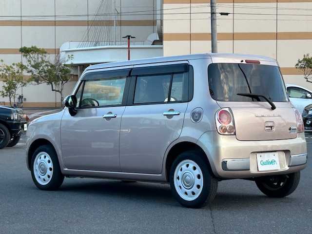 スズキ ラパン ショコラ X 宮城県 2014(平26)年 4.9万km シャンパンピンクPM 登録時走行距離４８２５２ｋｍ/プッシュスタート/アイドリングストップ/オートライト/スマートキー/ショコラ専用シート/純正フロアマット/ベンチシート/純正オーディオ/CD/AM/FM/LEDヘッドライト/ドアバイザー/純正アルミホイール/Wミラー/運転席シガーソケット/ABS/横滑り防止装置/オートライト