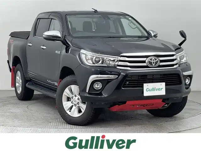 トヨタ ハイラックス Z 道央・札幌 2019(平31)年 4万km アティチュードブラックマイカ ・パートタイム４WD/・寒冷地仕様/・純正SDナビ/・CD/DVD/BT/フルセグ/SD/・バックカメラ/・ナビ連動型ETC/・純正前方ドライブレコーダー/・純正エンジンスターター/・衝突軽減ブレーキ/・横滑り防止装置/・レーンキープアシスト/・クルーズコントロール/・ダウンヒルアシストコントロール/・LEDヘッドライト/・前後フォグ/・ヘッドランプウォッシャー/・TRDマッドフラップ/・TRDフロントアンダーカバー/・TRDステッカー/・積込社外17インチAW夏タイヤ（265/65/R17　8mm）/・ドアバイザー/・プッシュスタート/・スマートキー/・スペアキー(スマートキーx1/板キーx2)/・取/保