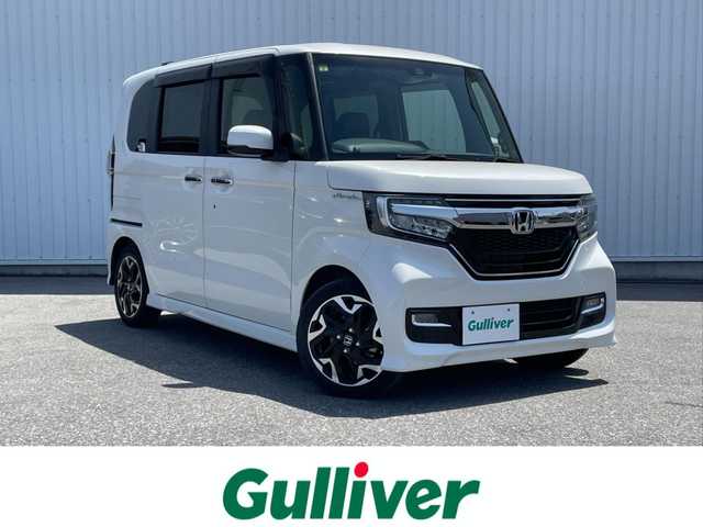 ホンダ Ｎ ＢＯＸ カスタム G L ターボ ホンダセンシング 滋賀県 2020(令2)年 2.8万km プラチナホワイトパール 社外メモリナビ/・AM/FM/・CD/DVD/・SD/USB/・内臓メモリ/・Bluetooth/・フルセグTV/バックカメラ/ステアリングスイッチ/革巻きステアリング/パドルシフト/両側パワースライドドア/前席シートヒーター/USB充電スポット/ビルトインETC/衝突軽減ブレーキ〈CMBS〉/誤発進抑制機能/歩行者事故低減ステアリング/先行車発進お知らせ機能/標識認識機能/路外逸脱抑制機能/ACC〈アダプティブ・クルーズ・コントロール〉/LKAS〈車線維持支援システム〉/後方誤発進抑制機能/オートハイビーム/オートリトラミラー/オートマチックヘッドライト/LEDヘッドライト/フォグランプ/リアロールサンシェード