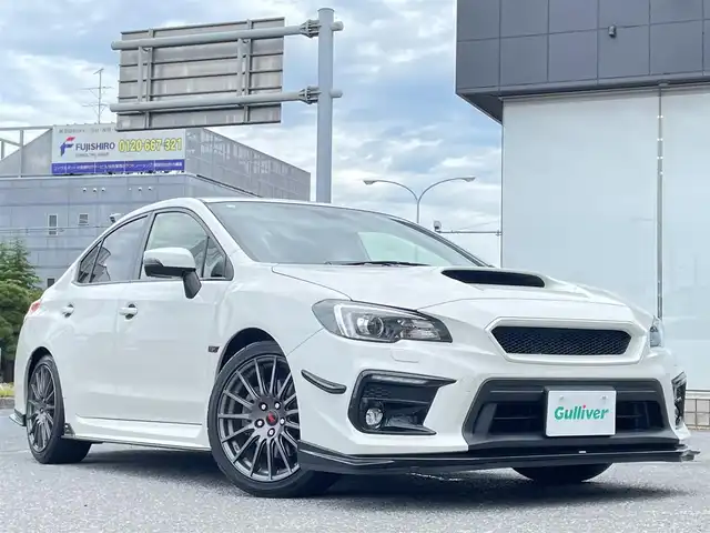 スバル ＷＲＸ Ｓ４ STIスポーツアイサイト 千葉県 2018(平30)年 11.1万km クリスタルホワイトP アイサイト/・プリクラッシュブレーキ/・緊急時プリクラッシュステアリング/・後退時ブレーキアシスト/・AT誤発進抑制制御&AT誤後進抑制制御/・ツーリングアシスト/・全車速追従機能付クルーズコントロール/・車線逸脱抑制/・警報機能/・先行車発進お知らせ機能/・スバルリヤビークルディテクション（後側方警戒支援システム）/STIフロントスポイラー/STIフロントアンダースポイラー/STIサイドアンダースポイラー/STIリヤサイドアンダースポイラー/STIリヤアンダースポイラー/STIスカートリップ/社外マフラー/純正ナビ/・DVD/CD/AM/FM/TV/BTオーディオ/バックカメラ/ハーフレザーシート/シートヒーター/プッシュスタート/プッシュスタート/ETC/純正18インチAW/LEDヘッドライト/スペアキー/保証書/取扱説明書