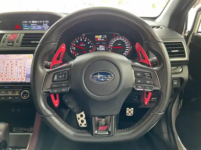 スバル ＷＲＸ Ｓ４ STIスポーツアイサイト 千葉県 2018(平30)年 11.1万km クリスタルホワイトP アイサイト/・プリクラッシュブレーキ/・緊急時プリクラッシュステアリング/・後退時ブレーキアシスト/・AT誤発進抑制制御&AT誤後進抑制制御/・ツーリングアシスト/・全車速追従機能付クルーズコントロール/・車線逸脱抑制/・警報機能/・先行車発進お知らせ機能/・スバルリヤビークルディテクション（後側方警戒支援システム）/STIフロントスポイラー/STIフロントアンダースポイラー/STIサイドアンダースポイラー/STIリヤサイドアンダースポイラー/STIリヤアンダースポイラー/STIスカートリップ/社外マフラー/純正ナビ/・DVD/CD/AM/FM/TV/BTオーディオ/バックカメラ/ハーフレザーシート/シートヒーター/プッシュスタート/プッシュスタート/ETC/純正18インチAW/LEDヘッドライト/スペアキー/保証書/取扱説明書